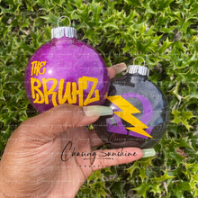 Load image into Gallery viewer, Omega Psi Phi - The Bruhz Ornament Set of 2
